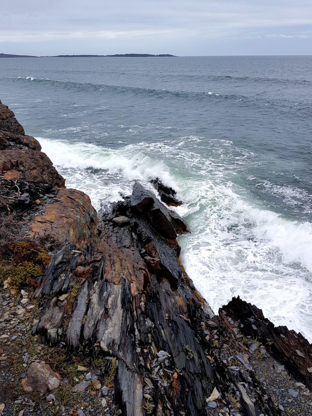 The crashing waves at Gaff Point are a big part of the hike and experience.