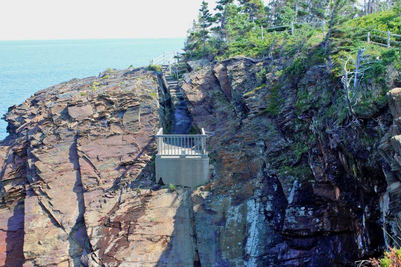 The Sea Caves trail at the Ovens has a couple of viewing platforms.  These will bring you closer to the cliffs.
