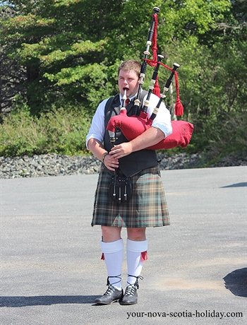 The piper at the Gaelic College plays everyday at noontime to the delight of visitors.
