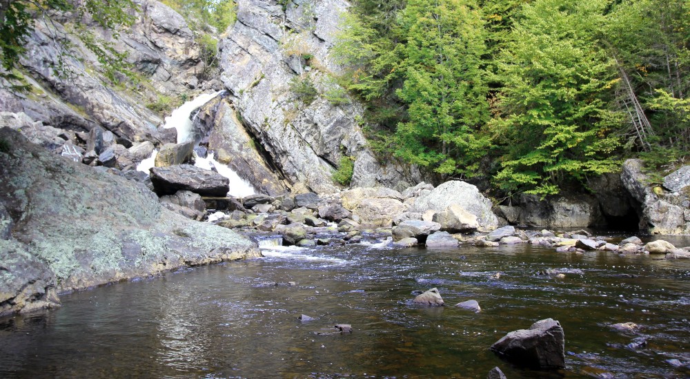 There appears to be a water cave to the right in this image.