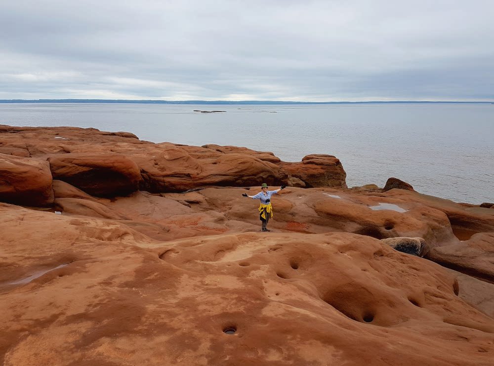 Roaming the red sandstone rocks at Thomas Cove is a great way to spend the day.